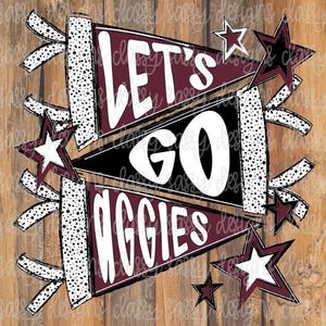 May include: A maroon, black, and white pennant design with the words "LET'S GO AGGIES" on a wooden background. The design includes star accents and dotted ribbons, ideal for showing team spirit.