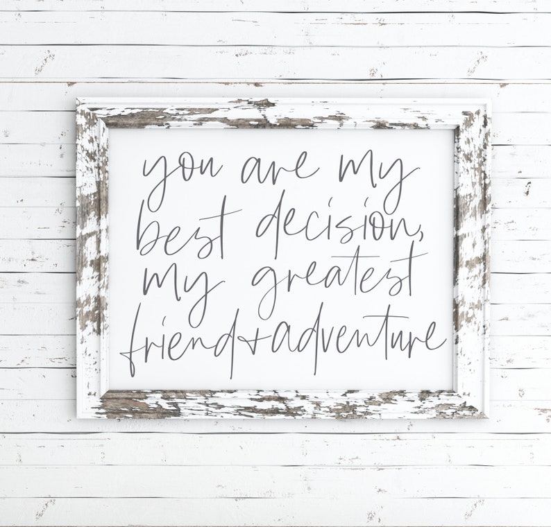 May include: White distressed wood frame with a white background and the text "You are my best decision, my greatest friend + adventure" in gray script font.