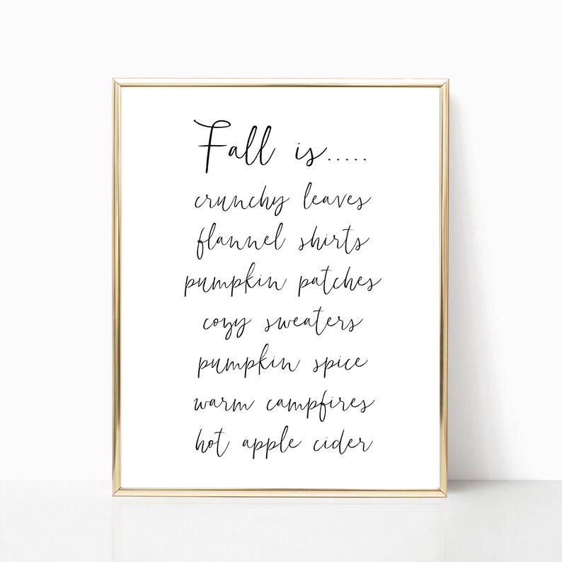 May include: A printable wall art design with the text "Fall is..... crunchy leaves, flannel shirts, pumpkin patches, cozy sweaters, pumpkin spice, warm campfires, hot apple cider".