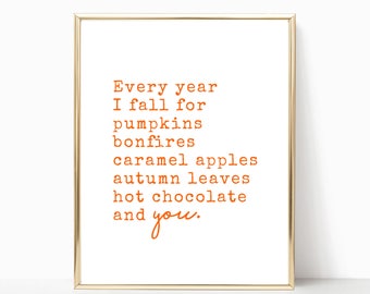May include: A printable quote in an orange font that reads "Every year I fall for pumpkins bonfires caramel apples autumn leaves hot chocolate and you."