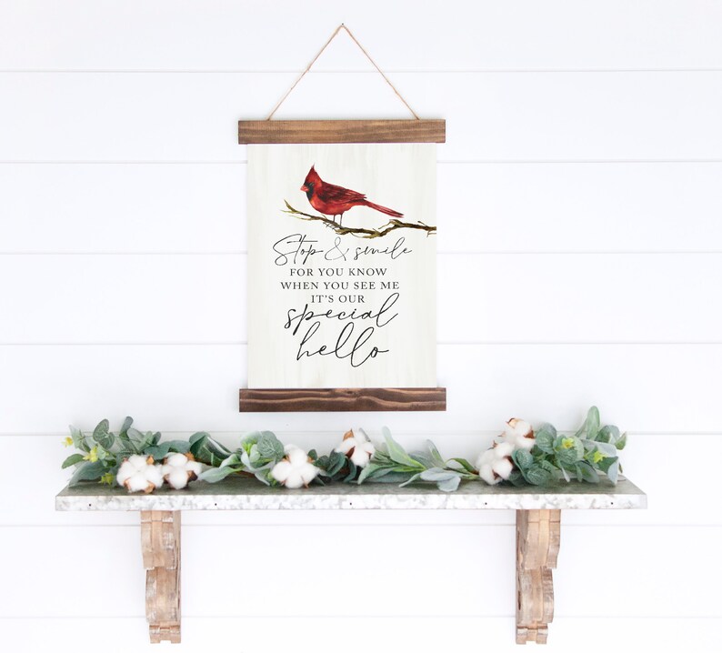 May include: A wooden sign with a red cardinal perched on a branch. The sign reads "Stop & smile for you know when you see me it's our special hello".