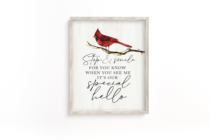 May include: A framed print with a white background featuring a red cardinal perched on a branch. The print includes the text "Stop & smile for you know when you see me it's our special hello."