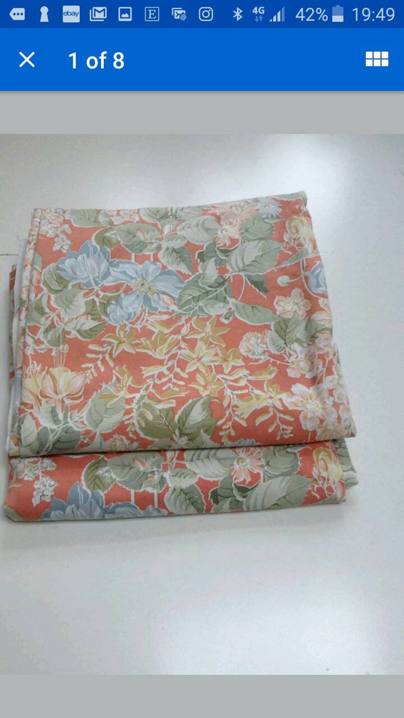 A Pair of vintage curtains with a floral screenprint design by Moygashel.