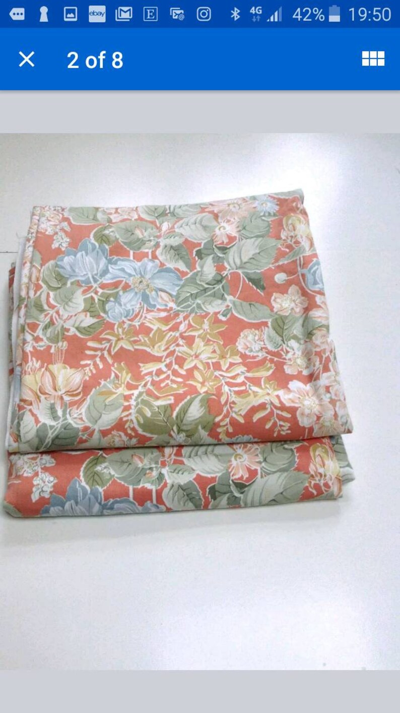 A Pair of vintage curtains with a floral screenprint design by Moygashel.