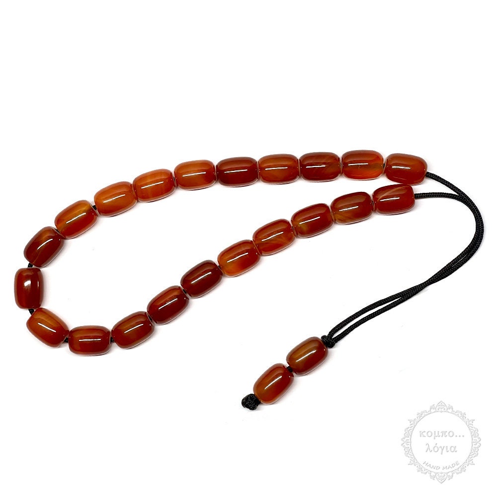 Carnelian handmade komboloi created with 21+2 carnelian gemstone beads of 10x14mm in oval shape, 28cm total length and 51g total weight.