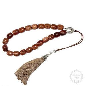 Brown Gold stone komboloi with 21 goldstone gem beads, these worry beads are made with gold stone barrels beads measuring 12x14mm in size.