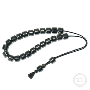 Hematite handmade komboloi created with 23+2 Hematite beads in drum shape of 8x8mm diameter, 22cm total length, and 43g total weight.