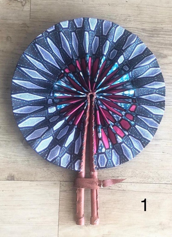 Hand-held fan kente