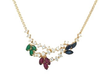 Collana con pendente a vite in oro giallo 18 carati con rubini, zaffiri, smeraldi e diamanti.