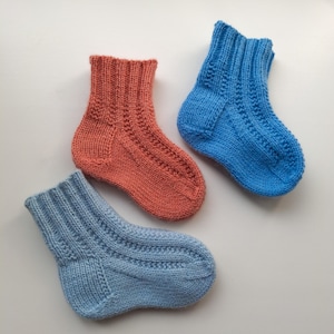 Hand Knitted Baby Blue Wool Socks: Cozy Winter Wear
