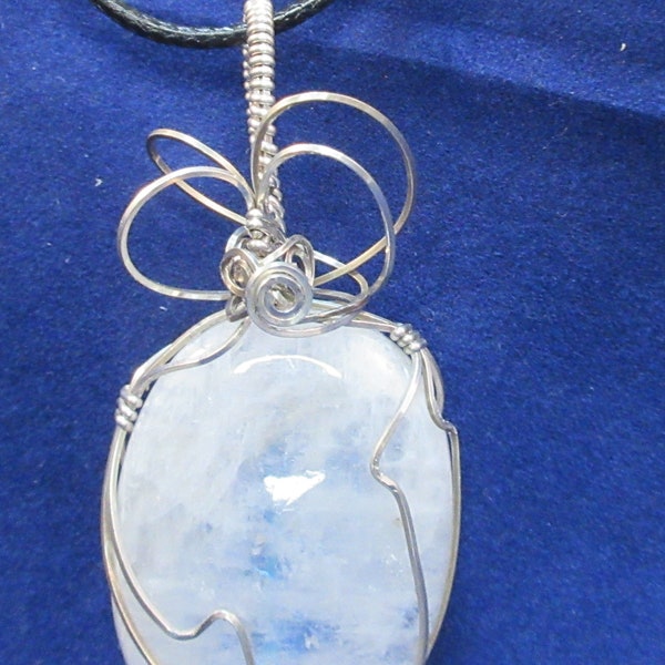 White Moon Stone wire wrapped in a Tarnish Resistant Silver Pendant