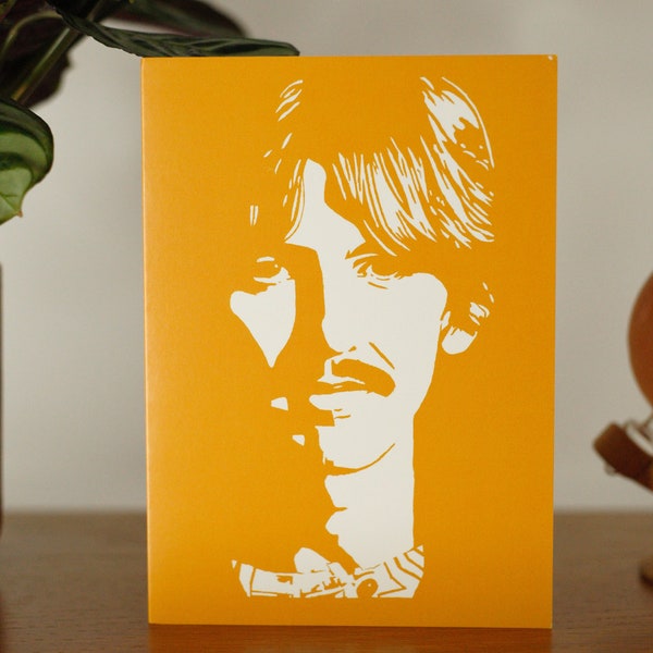 Greeting card featuring a portrait of George Harrison