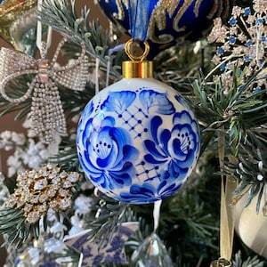 Hand painted Christmas bauble Blue and white bone china signed by artist Lana Arkhi