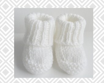 white newborn booties