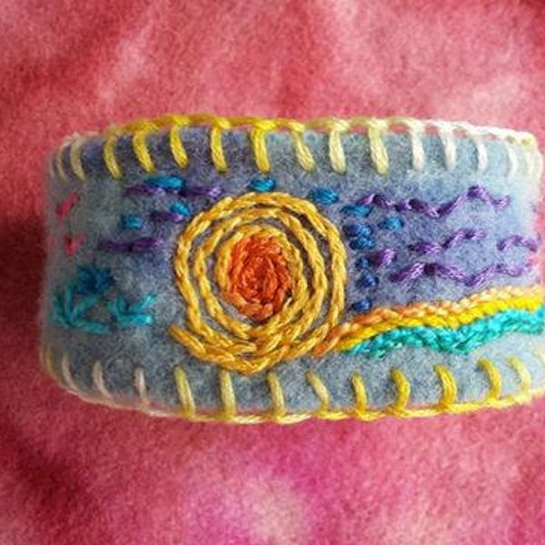 Hand embroidered recycled wool bracelet