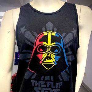 May include: Black tank top with a graphic of Darth Vader's head in the colors of the Philippine flag. The text "The Flip Side" is printed below the graphic.
