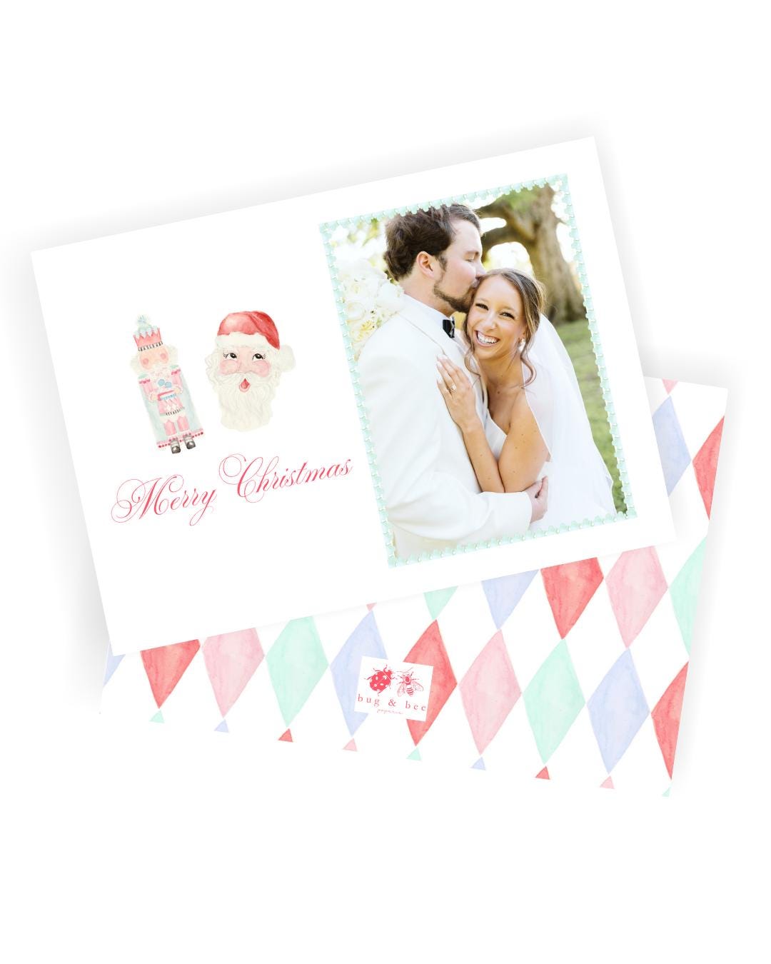 水彩画のくるみ割り人形とサンタのクリスマスカード | 縦向きまたは