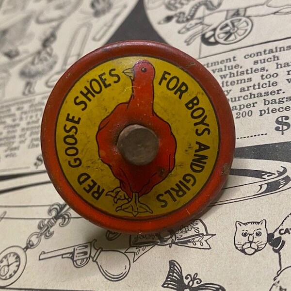 Vintage Red Goose Shoes Tin Litho Advertising Top Toy with Wooden Handle