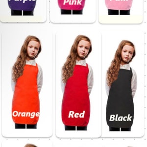 May include: Nine different colored children's aprons. The aprons are shown on models wearing white shirts. The colors are purple, hot pink, pink, orange, red, black, kelly green, yellow, and royal blue. The color of each apron is written below the model wearing it.