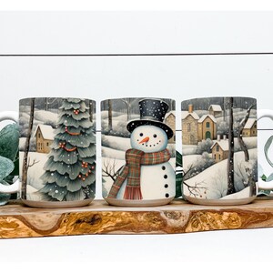 May include: Three ceramic mugs with winter scenes. One mug features a snowman with a top hat and scarf. Another mug shows a decorated Christmas tree. The third mug depicts a snowy village scene.