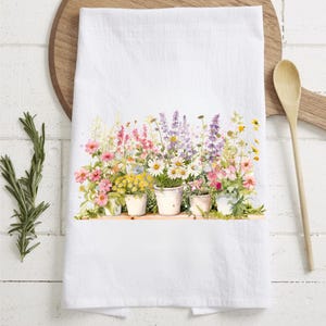 Paño de cocina con flores de primavera en maceta, decoración de jardín en tonos pastel