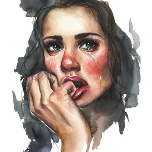 May include: A watercolor painting of a face with dark hair, featuring visible tears streaming down flushed cheeks. The subject has red lips, with one hand raised to the mouth, biting a finger. The background consists of abstract dark gray ink washes.