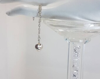 Silver plated small heart locket necklace pendant. Heart set with CZ (cubic zirconia).