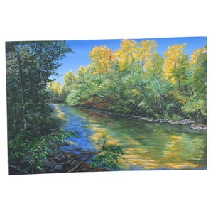 May include: Oil painting of a river scene with a blue sky. The water reflects the trees and sky, with green, yellow, and blue hues. Trees line the riverbanks, creating a natural landscape.