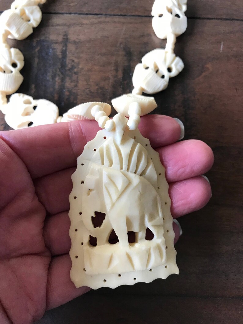 Vintage Carved Bone Elephant Necklace Hand Image 0