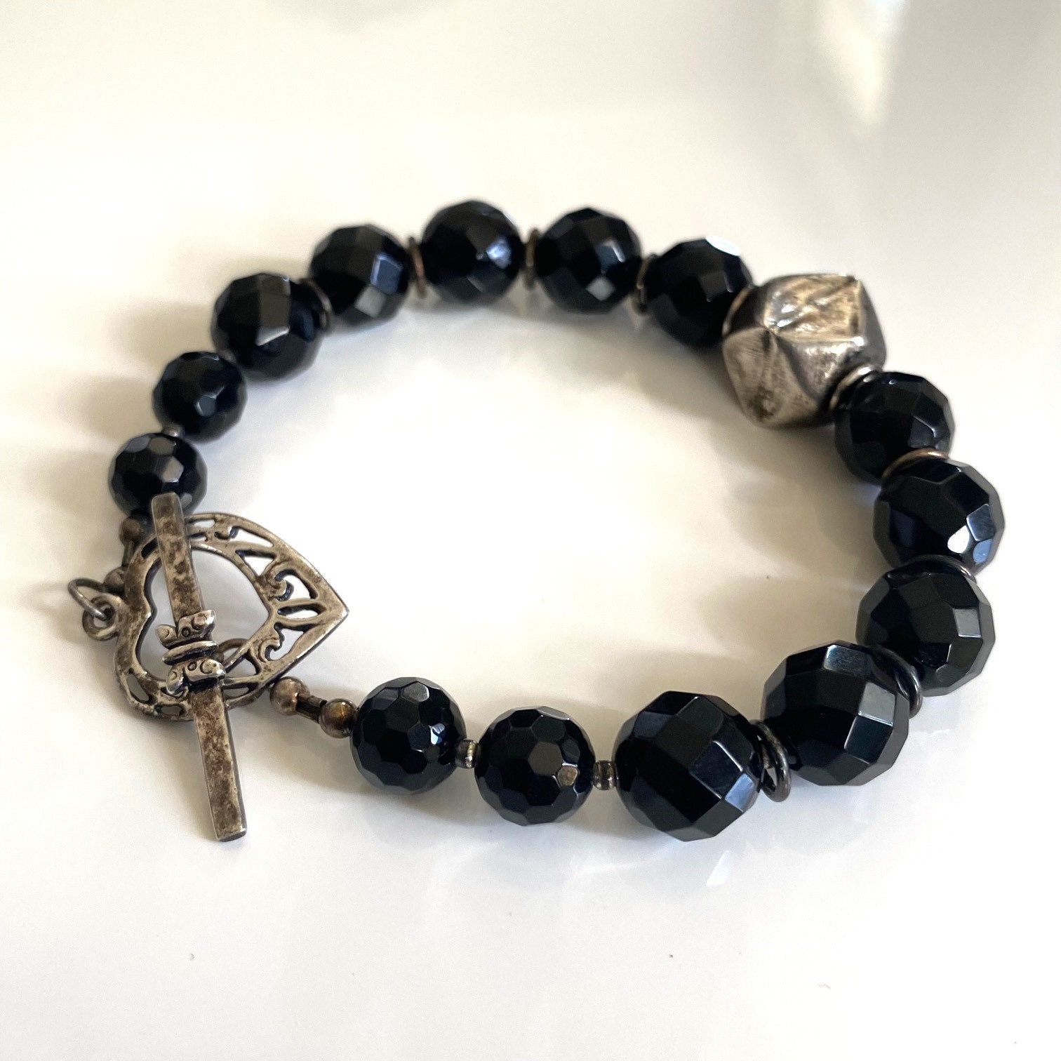 Vintage Sterling Silver Onyx Bracelet, Faceted Black Glass Bead Heart Toggle Bracelet, Sterling Accents, Black 925 Silver Bead Bracelet - Etsy Vintage Sterling Silver Onyx Bracelet, Faceted Black Glass Bead Heart Toggle Bracelet, Sterling Accents, Black 925 Silver Bead Bracelet - Etsy