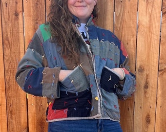 Cropped Vintage Quilt Jacket. 3 pockets. Size Large. Made from recycled suit/clothing quilt.