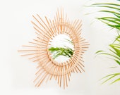 Vintage style rattan starburst mirror