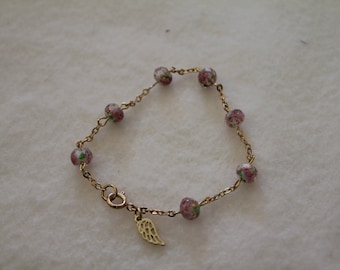 prayer bracelet, roses and angel wing bracelet