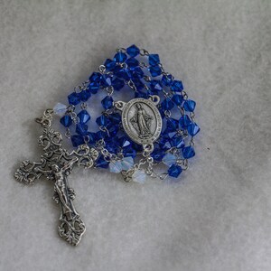 Rosary Beads Blue & White with Miraculous Medal centerpiece