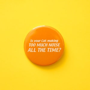 May include: Orange button with the text "Is your Cat making TOO MUCH NOISE ALL THE TIME?" on a yellow background.