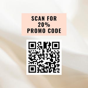 May include: A white background with a pink rectangle that says "SCAN FOR 20% PROMO CODE". Below the rectangle is a black and white QR code.