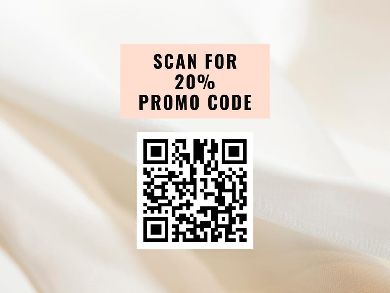May include: A white background with a pink rectangle that says "SCAN FOR 20% PROMO CODE". Below the rectangle is a black and white QR code.