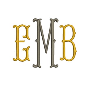 May include: A monogram design featuring the letters E, M, and B. The letter M is in a dark gray color, while the letters E and B are in a gold color. The letters have a decorative, ornate font style.