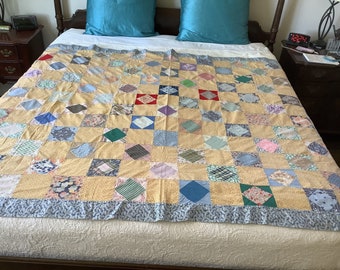 Vintage 1940s quilt coverlet.  Quilt top.  Beautiful  fabrics from the 1940s. Square within a square design. 67” x 101”.  Long!