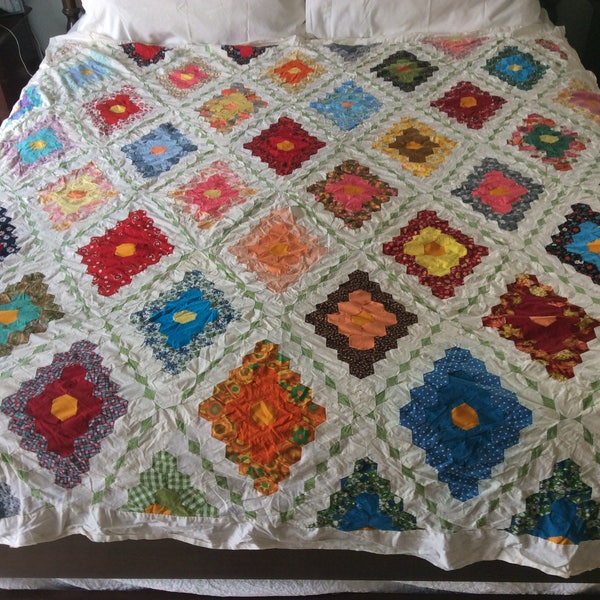 Vintage c.1970's "Jewel Box" quilt top.  Newly washed and Very colorful! All hand stitched, 78" x 73" without borders.  Has been repaired.