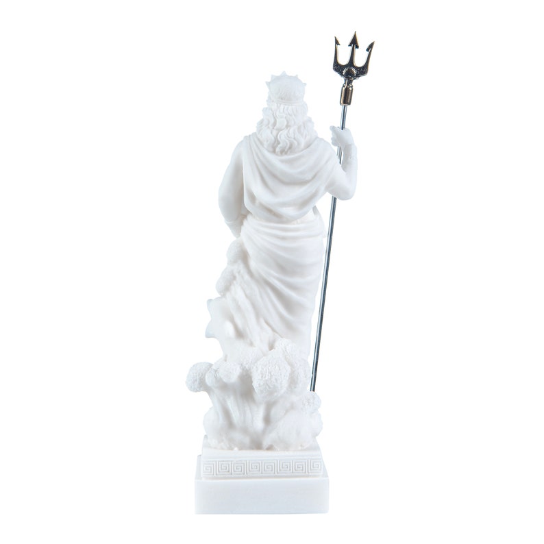 May include: White marble statue of Poseidon, the Greek god of the sea, holding a trident. The statue is standing on a base with a Greek key design.