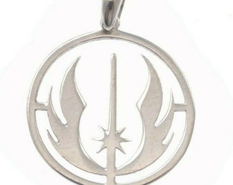 May include: Silver pendant featuring a circular design with a lightsaber and wings, resembling the Rebel Alliance symbol from Star Wars.