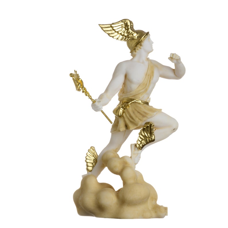 May include: White marble statue of a winged figure with gold accents. The figure is standing on a cloud-like base and holding a staff. The statue is a depiction of the Greek god Hermes.