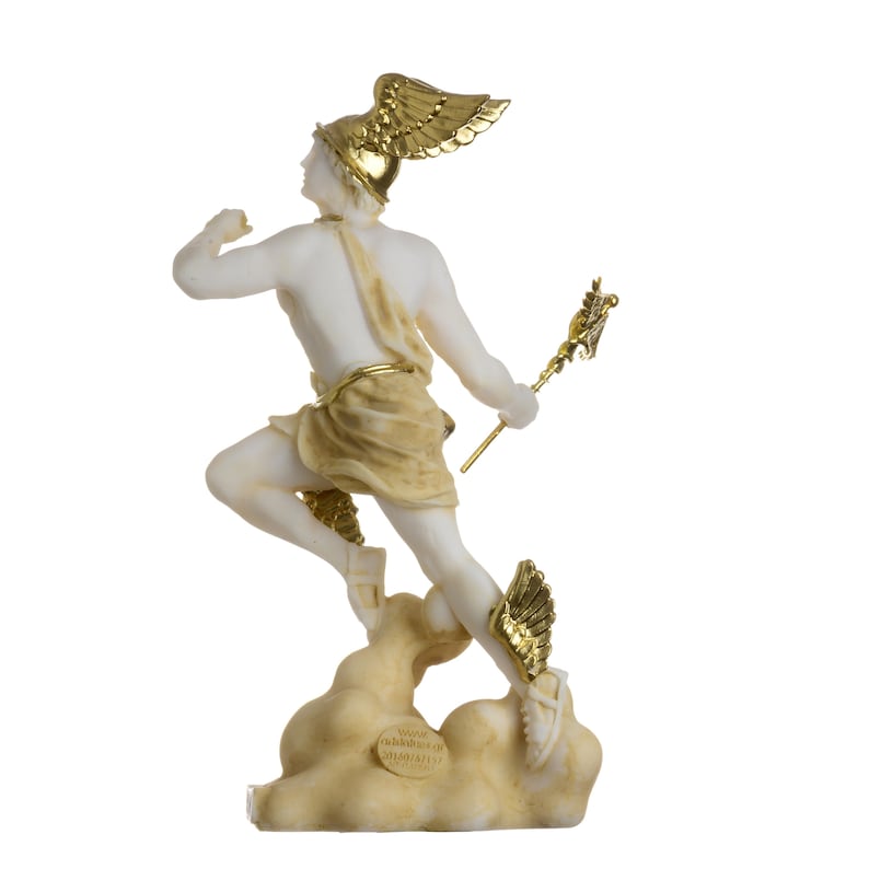 May include: A white marble statue of a winged Greek god, Hermes, with gold accents. He is depicted in mid-flight, holding a staff with a winged serpent at the top. The statue is standing on a cloud-shaped base.