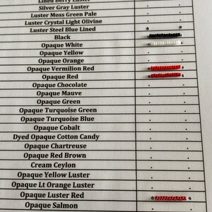 May include: A chart with a list of bead colors and their corresponding names. The colors are displayed in rows with small beads next to each name. The colors include fuchsia, crystal, light topaz, lined light amethyst, olivine, lined berry, silver gray, luster moss green, luster crystal, luster steel blue, black, opaque white, opaque yellow, opaque orange, opaque vermilion red, opaque red, opaque chocolate, opaque mauve, opaque green, opaque turquoise green, opaque turquoise blue, opaque cobalt, dyed opaque cotton candy, opaque chartreuse, opaque red brown, cream ceylon, opaque yellow luster, opaque light orange luster, opaque luster red, opaque salmon, and gunmetal.