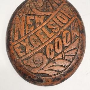 Antique, Excelsior  New Cook, Cast Iron Medallion, Plaque, Panel, Trivet? Circa believed to be  pre 1900.