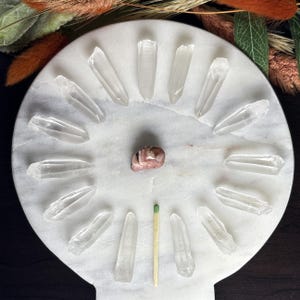15 pieces Lemurian Seed Quartz Crystal Points
Weight: 53.72 grams
Material: Quartz 
Variety: Lemurian Seed Quartz Crystals 
Quantity: 15
Country of origin: Brazil
Ships from : USA