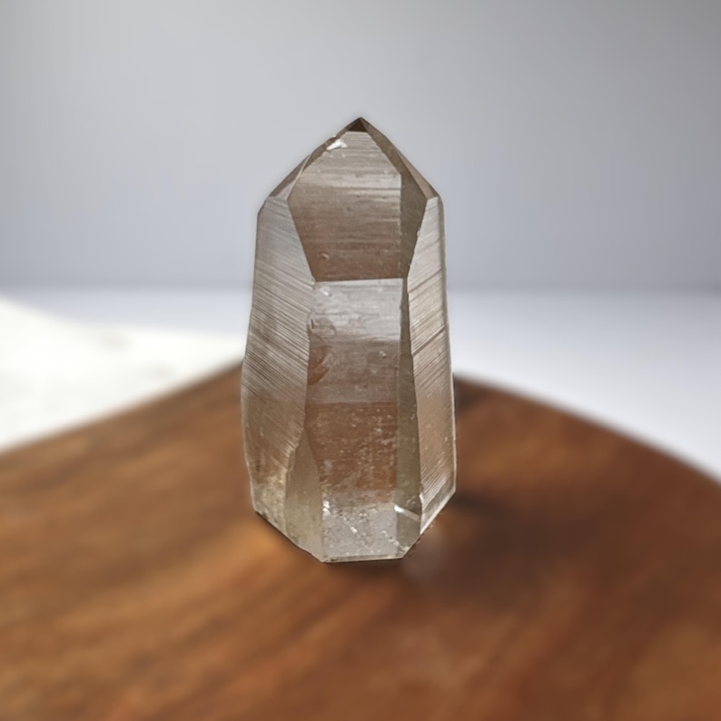** POLISHED Smokey Channeler Point: 93g; 64x31x34mm