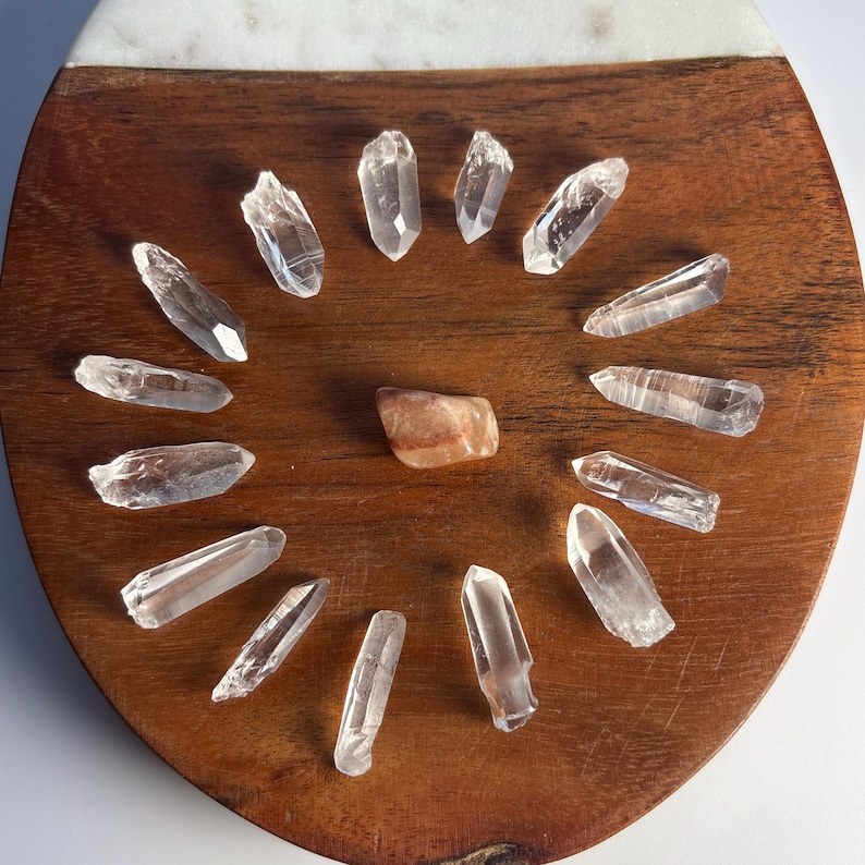 15 pieces Lemurian Seed Quartz Crystal Points
Weight: 32.92 grams
Size : .84 to 1.11"
Material: Quartz 
Variety: Lemurian Seed Quartz Crystals 
Quantity: 15
Country of origin: Brazil
Ships from : USA