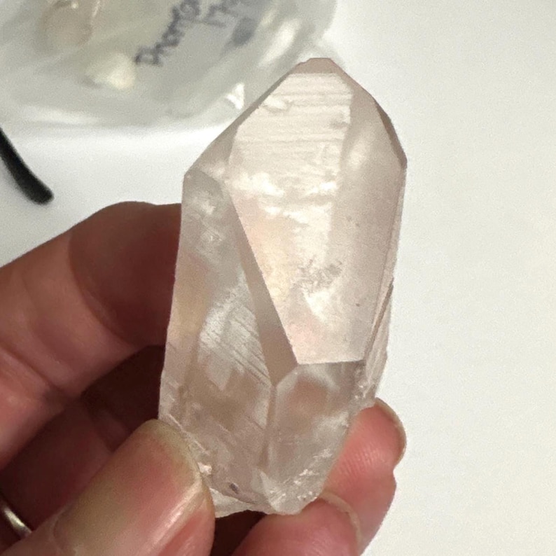 Sold Out - Channeler Lemurian Point: 33.76; 51x23x25mm
i see several faces within this crystal!